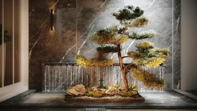 Căn nhà được tô điểm thêm với cây cảnh, bể
nước.