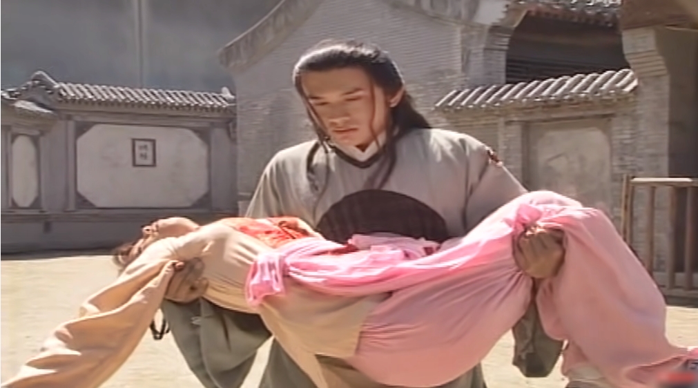 Phân cảnh Đan Trường ẵm&nbsp;Cẩm Ly trong MV "Mưa Buồn"