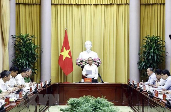 Chủ tịch nước Nguyễn Xuân Phúc chủ trì buổi làm việc với Thường trực Hội đồng Tư vấn đặc xá và một số cơ quan liên quan. Ảnh: TTXVN
