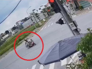 Tin tức trong ngày - Clip: Phóng xe máy vun vút vượt đèn đỏ, tài xế lập tức &quot;rước họa vào thân&quot;