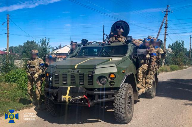 Xe của lực lượng an ninh Ukraine đi tuần ở Kupiansk, vùng Kharkiv, ngày 10/9