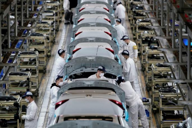 Nhu cầu bên ngoài suy giảm tiếp tục làm giảm đầu tư vào lĩnh vực sản xuất ở Trung Quốc. Ảnh: Reuters