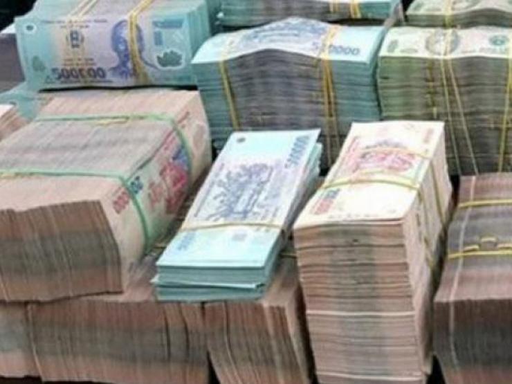 Kinh doanh - Tiền đồng Việt Nam sẽ mất giá bao nhiêu sau động thái nâng lãi suất của Ngân hàng nhà nước?