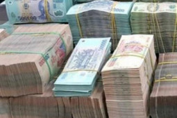 Kinh doanh - Tiền đồng Việt Nam sẽ mất giá bao nhiêu sau động thái nâng lãi suất của Ngân hàng nhà nước?