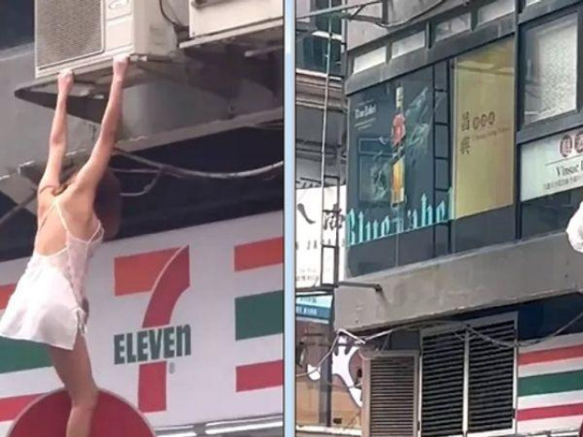 Phi thường - kỳ quặc - Cô gái ăn mặc "mát mẻ", cheo leo trên cửa sổ tầng 3 để trốn khỏi sự truy đuổi của cảnh sát