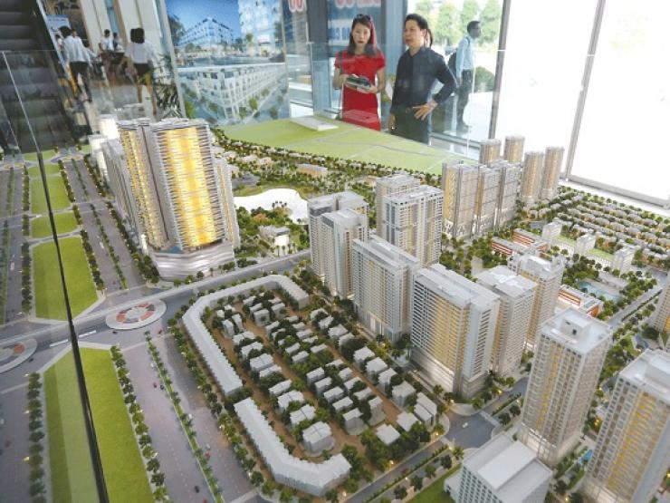 Kinh doanh - Loạt cổ phiếu ngành bất động sản nằm sàn: Có nên mua vào lúc này?