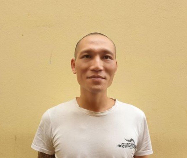 Trần Mạnh Hùng tại cơ quan công an.