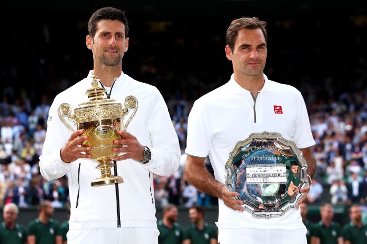 Nole (trái) cân bằng thành tích 46 lần vào bán kết Grand Slam của Federer (phải)