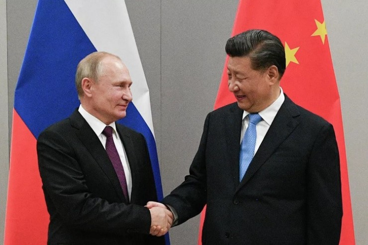 Tổng thống Nga Vladimir Putin (trái) và Chủ tịch Trung Quốc Tập Cận Bình trong một cuộc gặp hồi tháng 2-2022 tại Bắc Kinh. Ảnh: RIA NOVOSTI