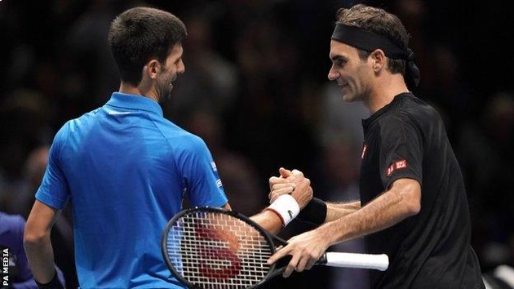 Djokovic (trái) nhận sự tin tưởng của Federer (phải)