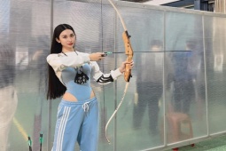 Thời trang - 2 mỹ nhân Việt "gây sốt" khi đi bắn cung, khéo mặc trang phục tôn thân hình trên 1m70