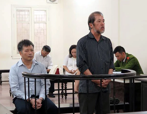 Hai bị cáo Nguyễn Huy Khang và Nguyễn Đình Bang tại giai đoạn xét xử trước đây.