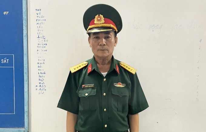 Nguyễn Phương Tùng lúc bị cơ quan điều tra bắt giữ. Ảnh: Nam An