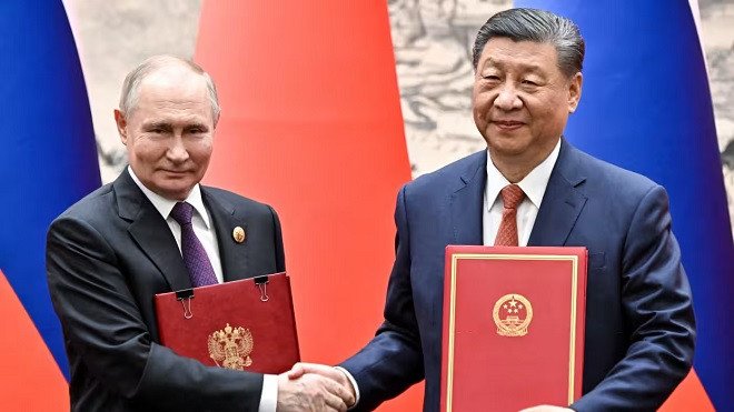Tổng thống Nga&nbsp;Vladimir Putin gặp Chủ tịch Trung Quốc Tập Cận Bình ở Bắc Kinh. Ảnh: Sputnik