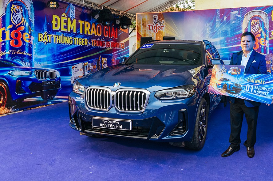 Tiger Beer trao xe BMW X3 Msport đầu tiên của chương trình khuyến mại “Bật thùng Tiger, trúng 5 BMW X3” ở Bình Dương - 1