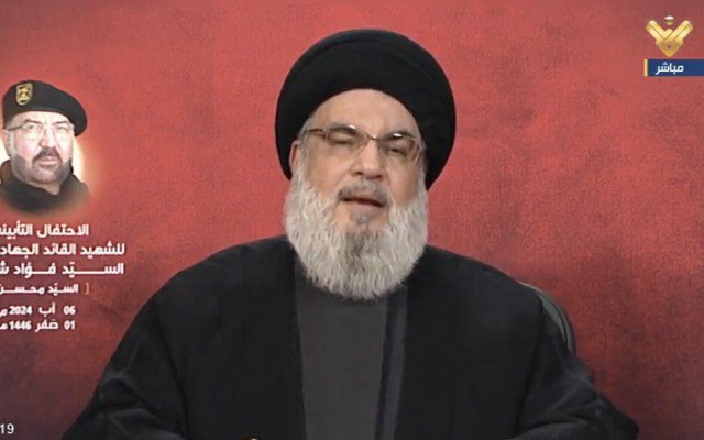 Thủ lĩnh Hezbollah Hassan Nasrallah phát biểu trên truyền hình hôm 6-8 - Ảnh: TIME OF ISRAEL