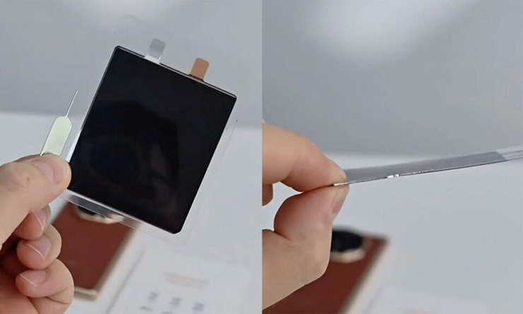 Linh kiện pin siêu mỏng mang tên "Hồ Thanh Hải" khi đặt cạnh một que chọc SIM.