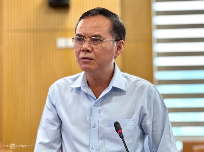 Ông Phạm Kim Đăng trả lời tại họp báo sáng 3/7. Ảnh: Gia Chính