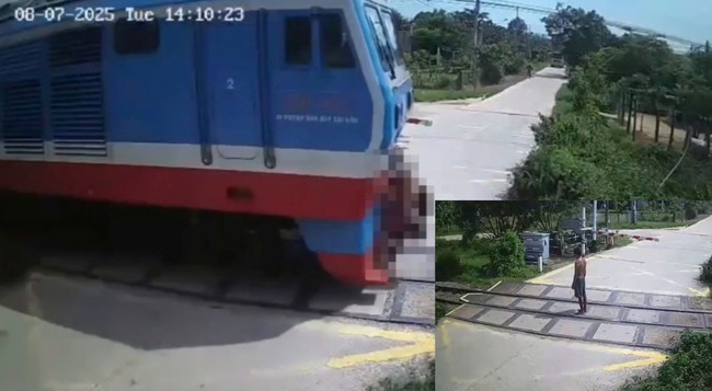 Người đàn ông đứng im giữa đường ray để đoàn tàu hỏa tông. Ảnh: DT