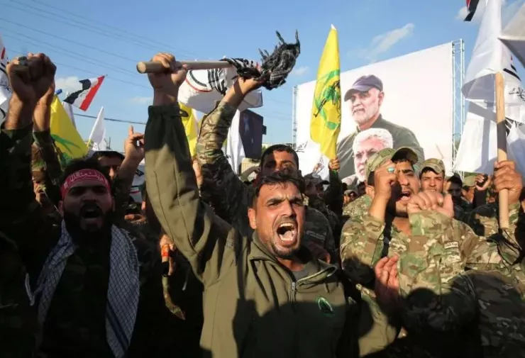 Các thành viên của lực lượng bán quân sự Hashed al-Shaabi - một nhóm thân Iran ở Iraq. Ảnh: AFP