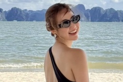 Phan Minh Huyền khoe body với áo tắm khoét hông cao