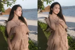Doãn Hải My đẹp dịu dàng, e ấp khoe vai trần bên bờ biển