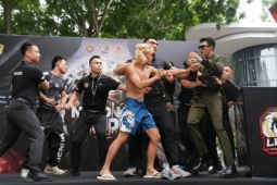 Võ sĩ Trung Quốc ngông nghênh, bị tay đấm Việt Nam dằn mặt gây xôn xao