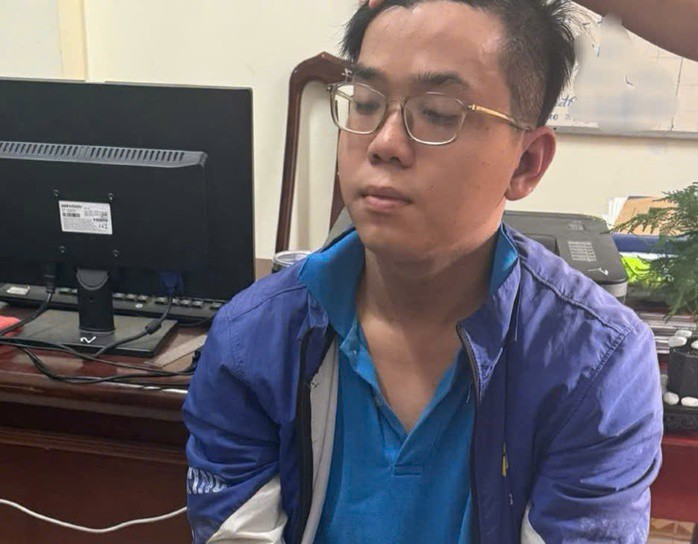 Nghi phạm Trần Văn Quý tại cơ quan công an