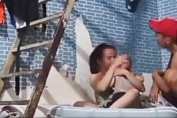 Vụ cô gái ôm con nhỏ bị đánh tới tấp: Đã bắt được Trung cá chép