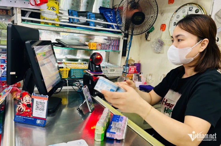 Đề xuất hộ kinh doanh bắt buộc phải đăng ký tài khoản ngân hàng cho hoạt động kinh doanh. Ảnh: N.L