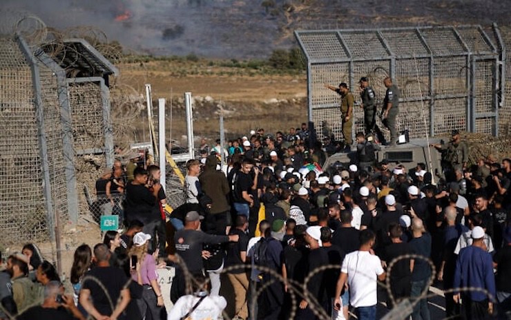 Cộng đồng người Druze bên phía Israel vượt biên giới sang Syria với mục đích bảo vệ đồng hương. Ảnh: AFP.