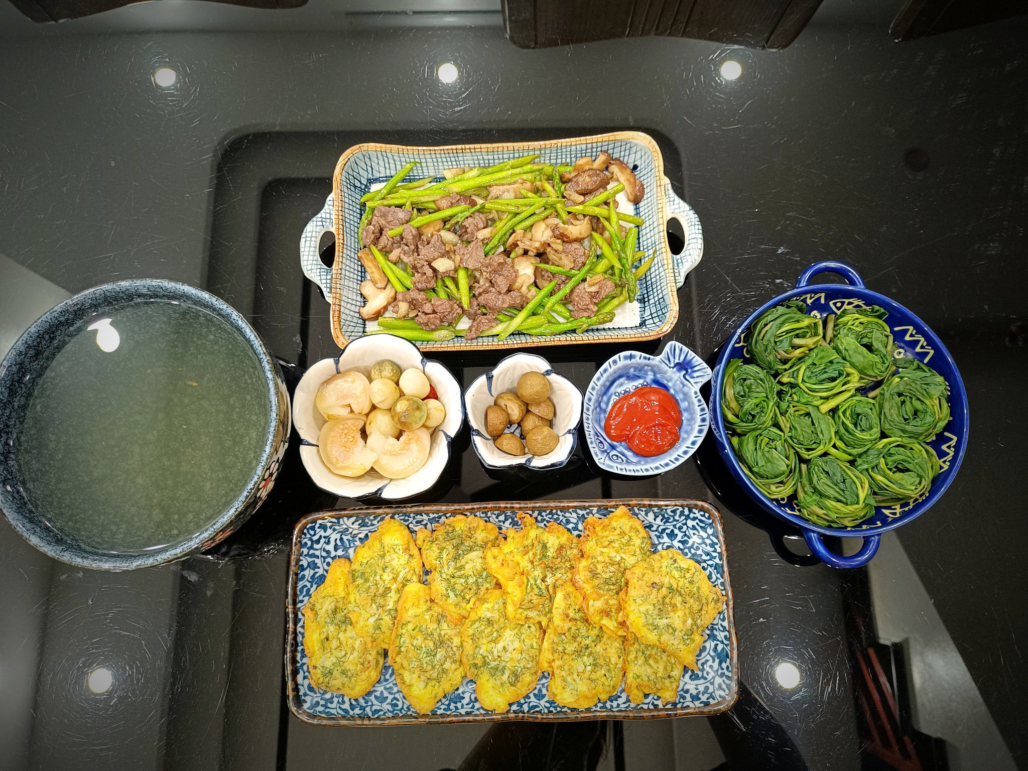 Thịt bò xào măng tây - Cả chá ngần biển - Rau muống luộc - Cà muối, sấu ngâm mắm