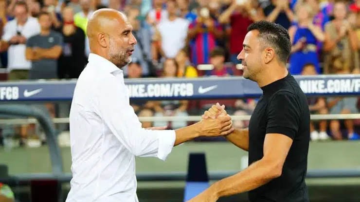 HLV Guardiola và Xavi bị mạo danh