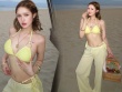 Xoài Non "đốt mắt" người hâm mộ với bikini vàng rực rỡ tại bãi biển