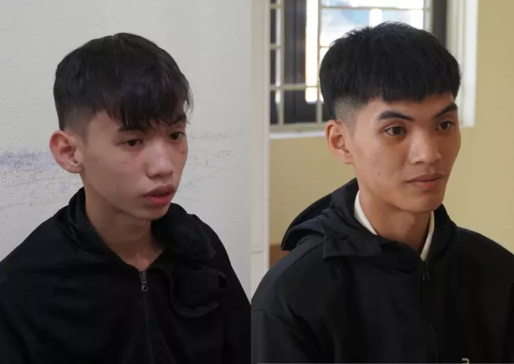 Đặng Trung Quân và Bùi Bảo Long tại cơ quan công an. Ảnh: CA