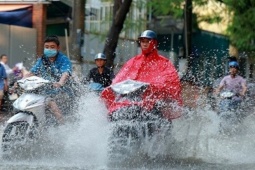 Tin tức trong ngày - Áp thấp nhiệt đới tiến sát đất liền, miền Bắc cao điểm mưa lớn