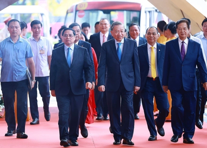 Lãnh đạo Đảng, Nhà nước vào Trung tâm triển lãm quốc gia. Ảnh: TTXVN