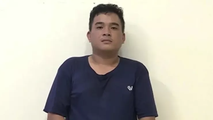 Dương Trí Tài tại cơ quan điều tra. Ảnh: CA