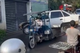 Thông tin mới vụ xe ba gác "cõng" ô tô gây bức xúc ở TP HCM