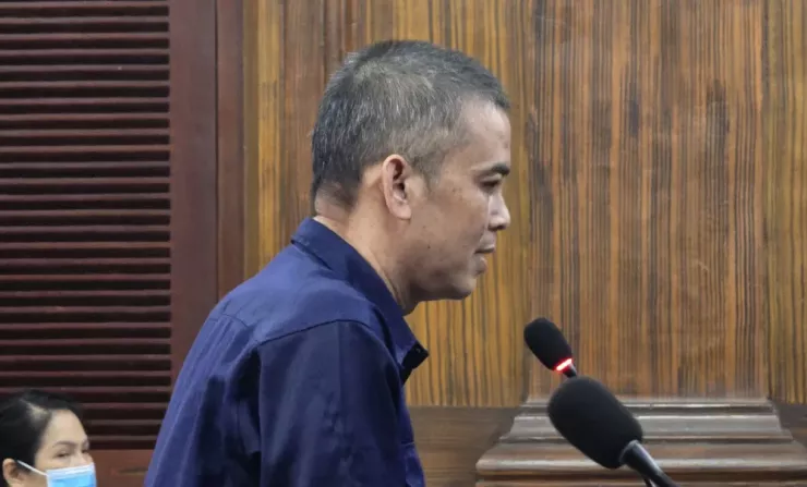 Ca sĩ Quốc Kháng tại phiên tòa. Ảnh: SONG MAI