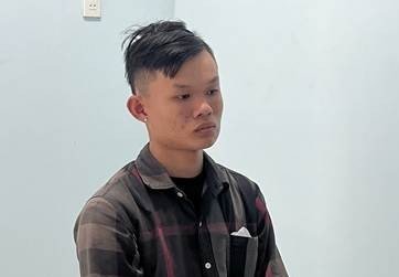 Bị can Lê Tấn Cường tại cơ quan công an.