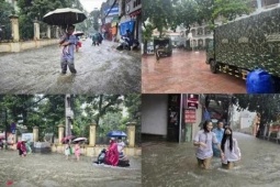 Tin tức trong ngày - Thủ đô ngập lụt chưa từng có: Quân đội điều xe cứu trợ, phụ huynh bì bõm cõng con tan trường