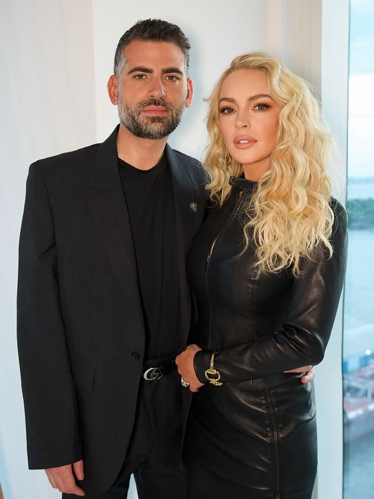 Lindsay Lohan và chồng - doanh nhân Bader Shammas - tại hậu trường chuẩn bị dự show thời trang của Gucci hồi tháng 5.