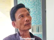Cha già nín thở nhìn thợ lặn tìm con ở vùng biển Mũi Nghê