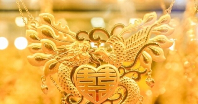 Giá vàng thế giới đột ngột bật tăng dữ dội tới gần 152 USD/ounce