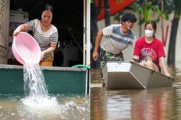 Người Hà Nội tát nước, bơi xuồng ngày mưa ngập