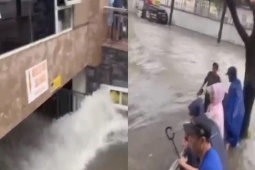 Nước mưa cuồn cuộn như thác tràn vào tầng hầm chung cư ở Nghệ An