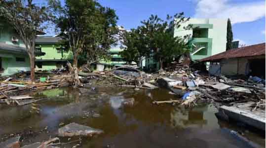 Những hình ảnh không thể tin nổi trước và sau thảm họa kép tại Indonesia - 10