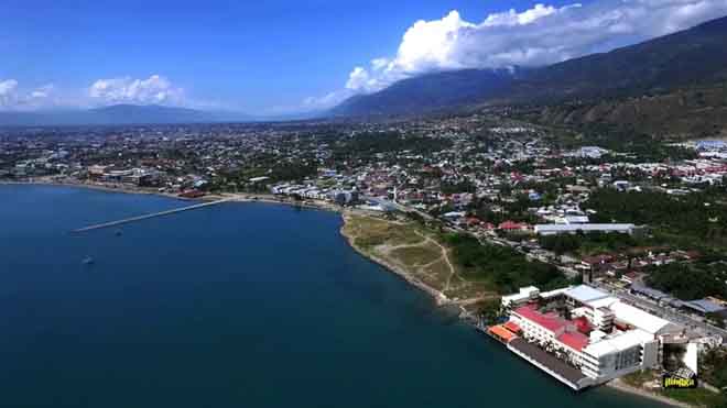 Những hình ảnh không thể tin nổi trước và sau thảm họa kép tại Indonesia - 13