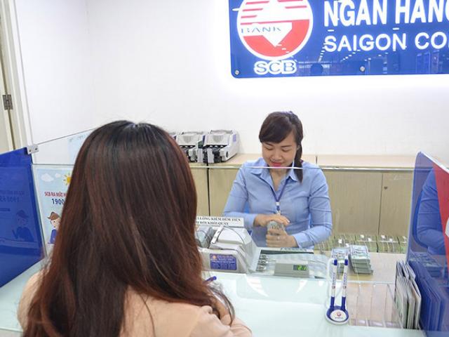 Kinh doanh - "Tỉ giá đang có lợi cho người giữ tiền Việt Nam"
